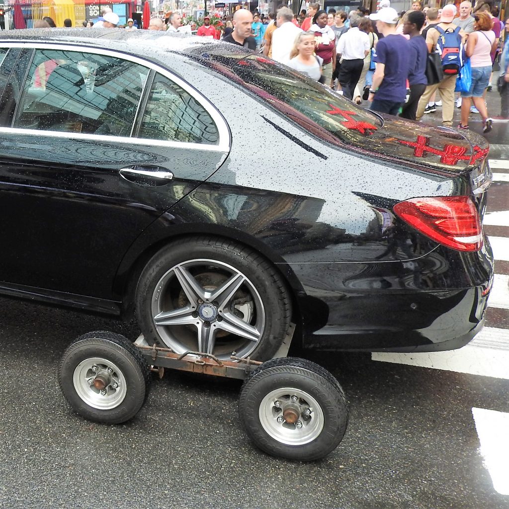 How To Unload Car From Tow Dolly?